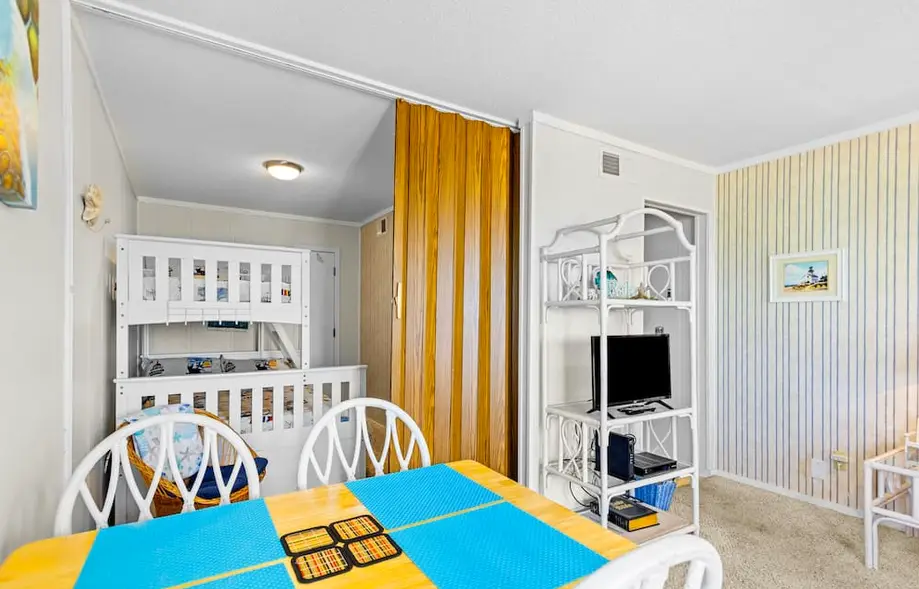 Ocean-view condo with beach access, pool, sports courts, & private balcony